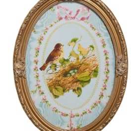 Oval framed picture of a bird on a nest with floral border