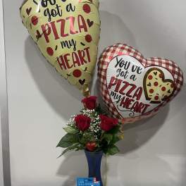 Roses in a blue vase with pizza-themed heart balloons and a Domino's gift card