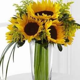 Sunflower bouquet in a clear glass vase