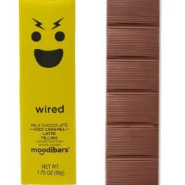 Yellow chocolate bar wrapper beside a segmented milk chocolate bar