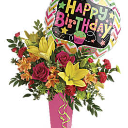 Birthday bouquet with roses, lilies, and a Happy Birthday balloon