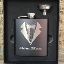 Black flask gift set with funnel and shot cup in a box