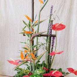 Tall tropical arrangement with bird of paradise and red anthuriums