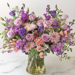 Lavender and pink bouquet in a clear glass vase