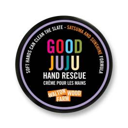Round tin of Good Juju hand rescue cream with colorful label