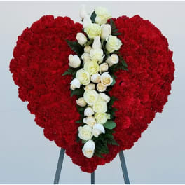 Heart-shaped red floral spray with white roses and calla lilies
