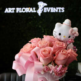 Pink rose bouquet in a pink hatbox with a Hello Kitty plush