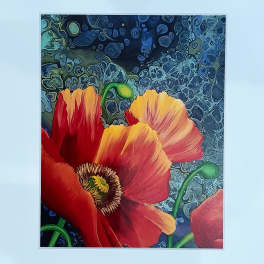 Framed art print of red and orange poppy flowers on an abstract blue background