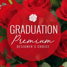 Red roses with a graduation label over the center