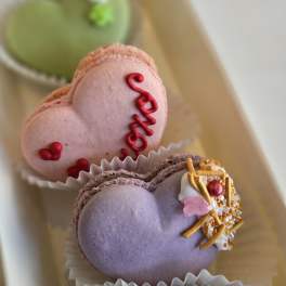 Heart-shaped macarons in a gift box