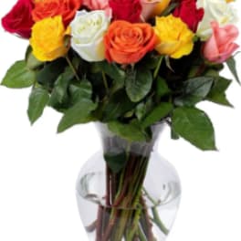 Mixed roses in a clear glass vase