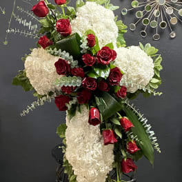Standing floral spray with red roses and white hydrangeas