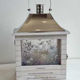 Decorative memorial lantern with butterfly and floral panel