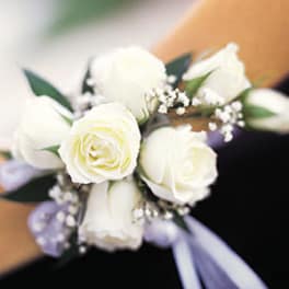 White rose wrist corsage with lavender ribbon