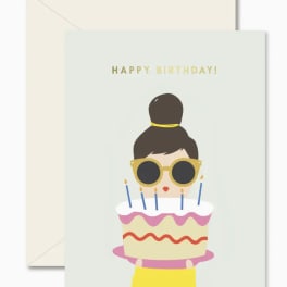 Birthday card with a cartoon woman holding a cake