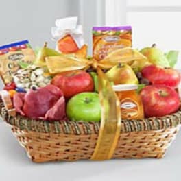 Fruit and snack gift basket with apples, pears, and packaged treats