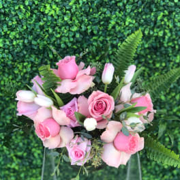 Pink rose bouquet with tulips and fern accents