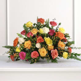 Colorful bouquet of roses arranged low and wide