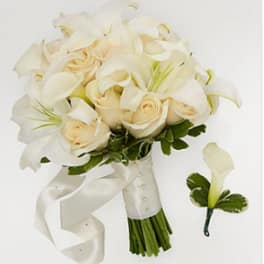White calla lilies and cream roses bouquet with ribbon handle