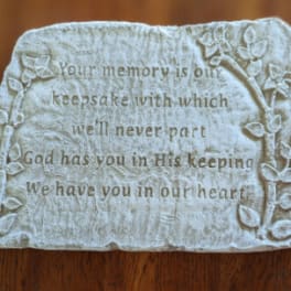 Memorial plaque with raised floral border and engraved sympathy verse