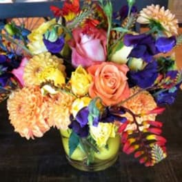 Colorful mixed bouquet in a glass vase