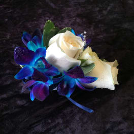 Small bouquet with white roses and blue-purple orchids