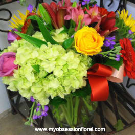 Colorful mixed bouquet with hydrangea, roses, and gerbera daisies