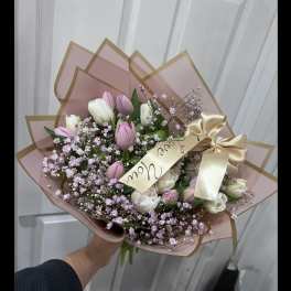 Pink and white tulip bouquet with baby's breath and a satin ribbon