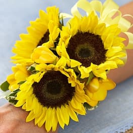 Yellow sunflower wrist corsage with ribbon