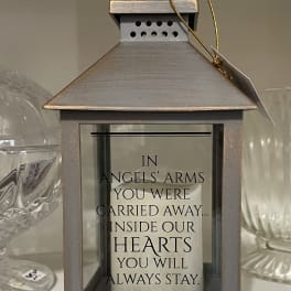 Decorative lantern with a memorial candle inside