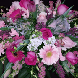 Pink mixed flower arrangement with roses and gerbera daisies