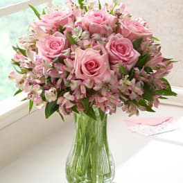 Peruvian lily and pink roses
