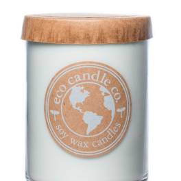 Soy wax candle in a glass jar with a wooden lid