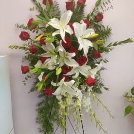 Standing floral spray with red roses and white lilies