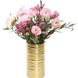 Pink flowers arranged in a gold vase