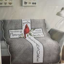 Gray memorial quilt with a red cardinal and text panels