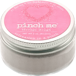 Pink jar of therapy dough with a heart label
