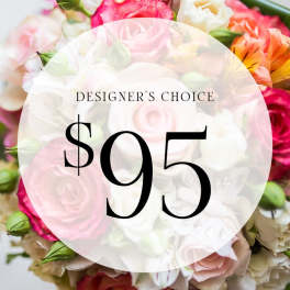 Mixed pink, white, and orange flower bouquet with a $95 designer's choice label