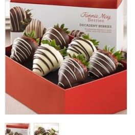 Box of chocolate-covered strawberries with white drizzle