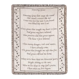 Fringed throw blanket with the text of Amazing Grace printed on it