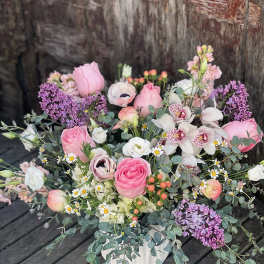 Pink and white mixed bouquet in a white vase