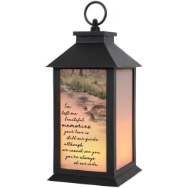 Black memorial lantern with a printed sympathy message and sunset scene