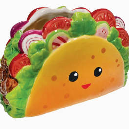 Taco-shaped decorative pillow with a smiling face