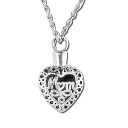 Silver heart-shaped pendant necklace with a decorative cutout design