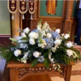 Blue and White casket spray