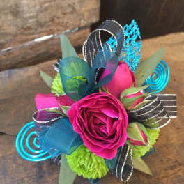 Bright pink rose with lime green and blue ribbon accents