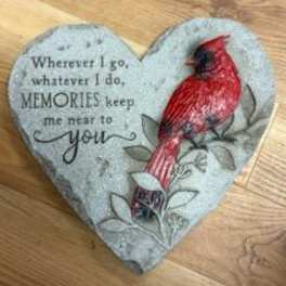 Heart-shaped decorative plaque with a red cardinal and memorial text