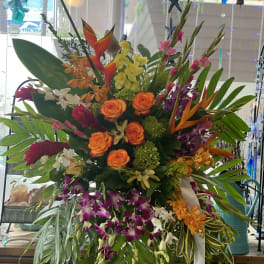 Large tropical bouquet with orange roses and purple orchids
