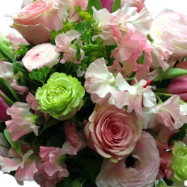 Pink and white bouquet with roses, ranunculus, and sweet peas