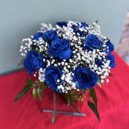 Bouquet of blue roses with white baby's breath